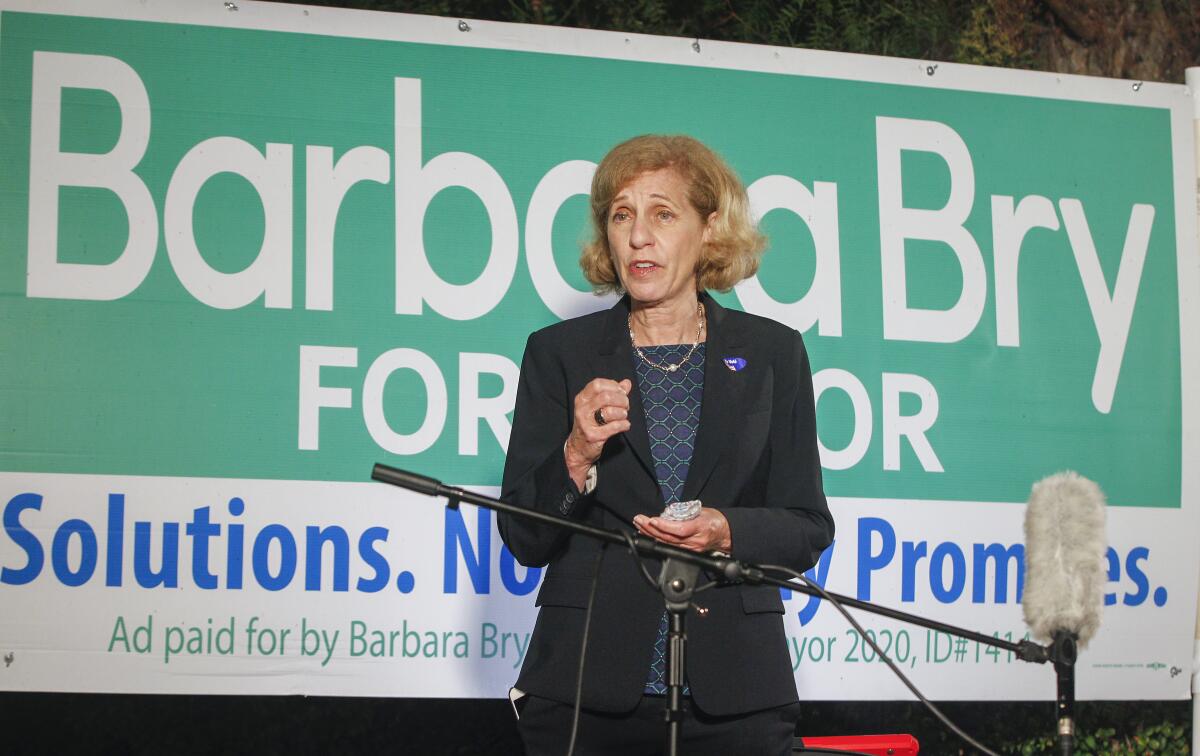 San Diego City Councilwoman and mayoral candidate Barbara Bry speaks to supporters at a home in North Park.