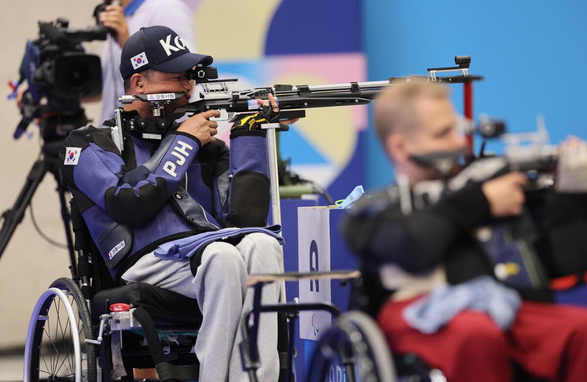 South Korea's Jinho Park competes in men's 10-meter air rifle at the Paralympics on Saturday.