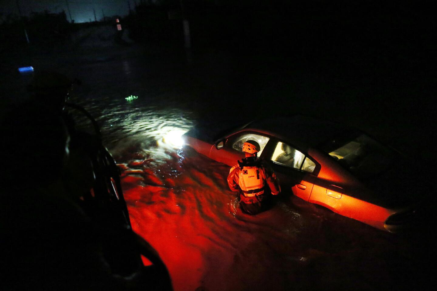A rescue team inspects flooded areas after the passing of Hurricane Irma on Sept. 6, 2017, in Fajardo, Puerto Rico.