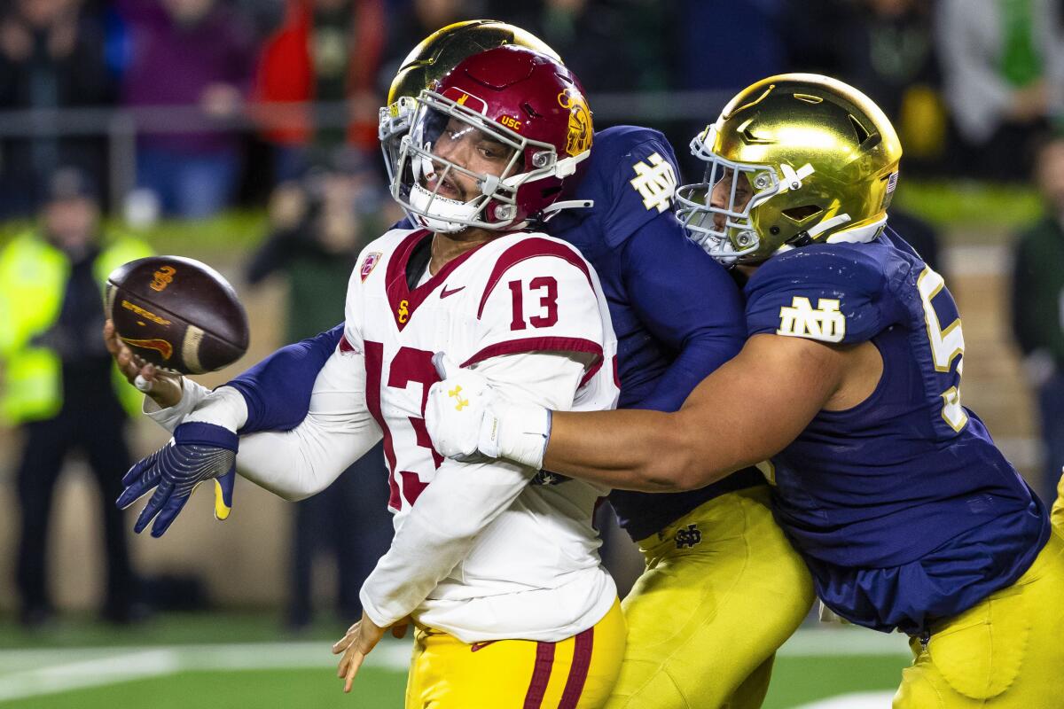 USC quarterback Caleb Williams is sacked as he attempts to throw the ball.