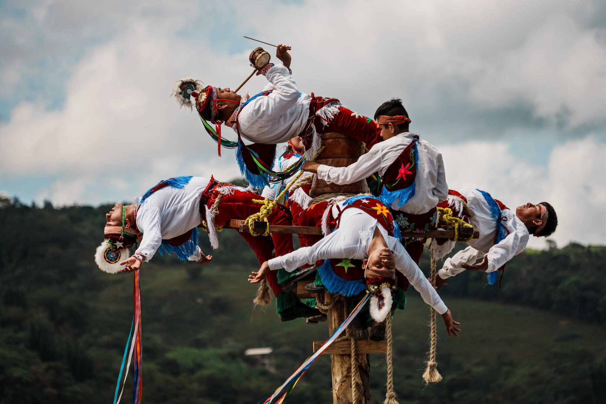 A 100-foot drop, a death-defying ritual: Mexican children learn
