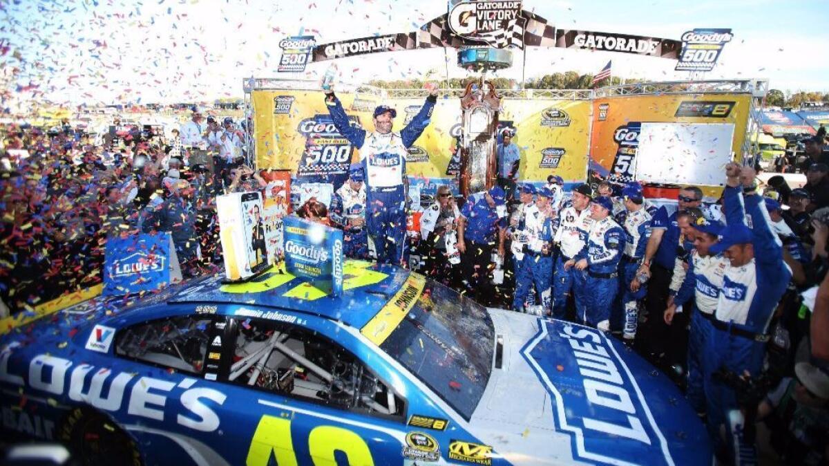 Nascar driving Jimmie Johnson celebrates after his victory at Martinsville Speedway on Oct. 30.