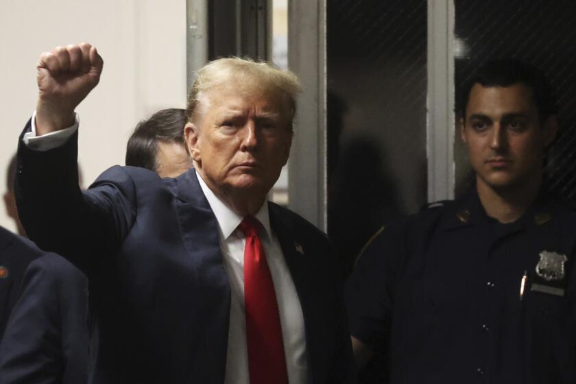 Former President Donald Trump reacts as he walking back into the courtroom after a break during closing arguments in his hush money trial at Manhattan criminal court in New York, Tuesday, May 28, 2024. (Spencer Platt/Pool Photo via AP)