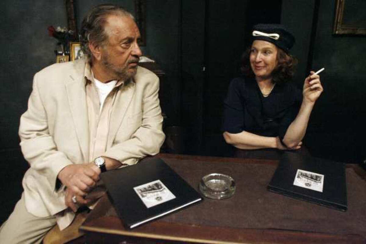 Actors Jack Heller, left, and Louise Davis run through a scene before performing "Tennessee in the Summer" at the Sidewalk Studio Theatre in Burbank.