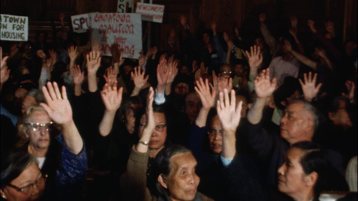 A still from Harry Chuck's decades-old footage of San Francisco Chinatown protesters advocating for affordable housing.