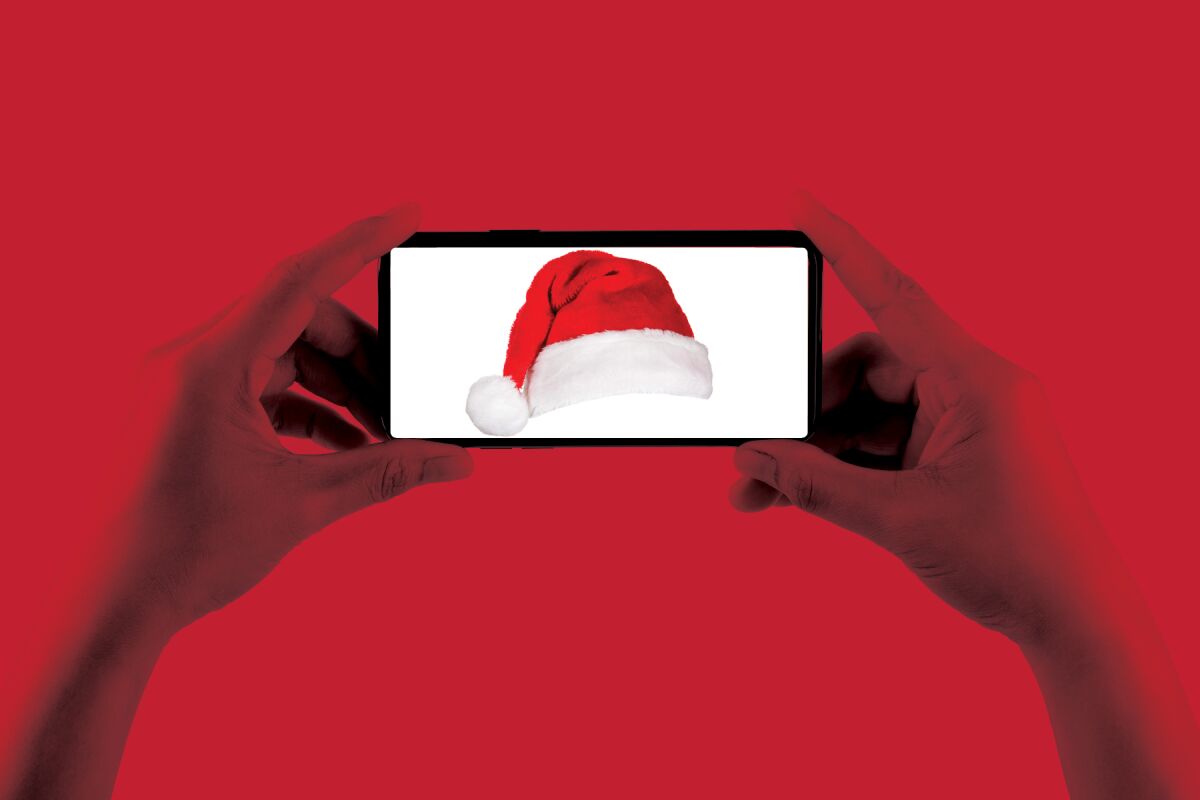 An illustration of a Santa hat on a cellphone screen