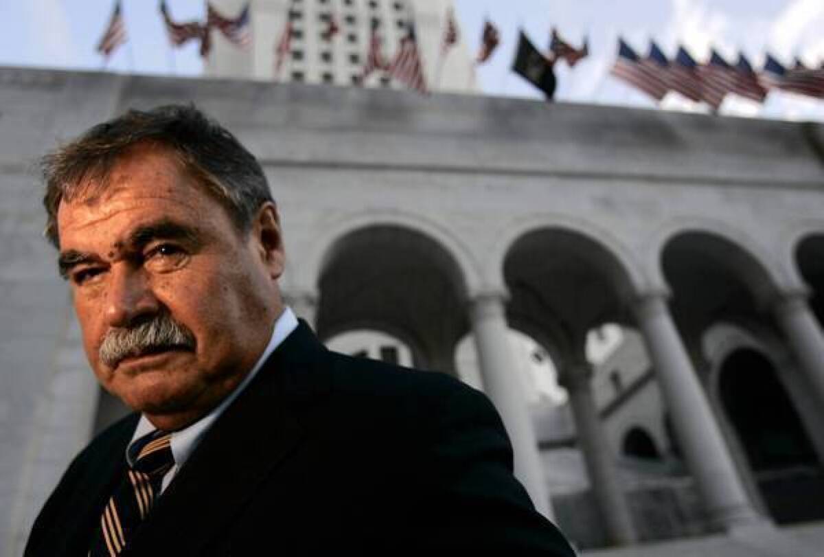 Teacher Sal Castro in front of Los Angeles City Hall in 2004. He was one of the leaders of the 1968 Latino student walkouts, a protest for better schools that was a seminal event in the development of the Chicano movement.