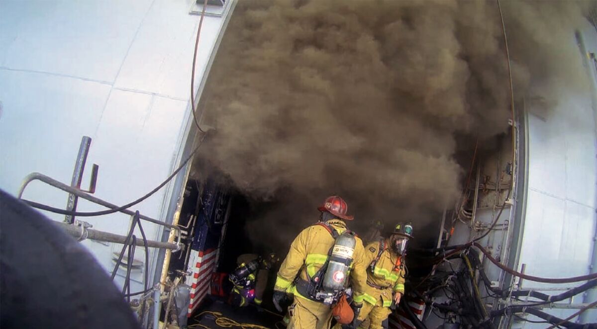 A screen capture from a SDFD firefighter's helmet-mounted camera footage.