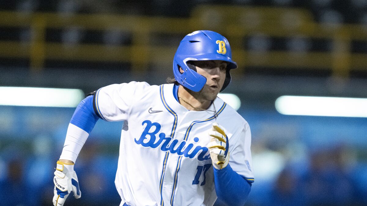 UCLA's Jack Holman runs the bases during a game.
