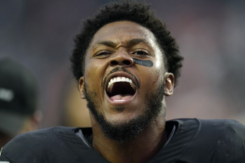 Las Vegas Raiders running back Josh Jacobs celebrates after a win over the Denver Broncos in an NFL football game Sunday, Oct. 2, 2022, in Las Vegas. (AP Photo/Abbie Parr)