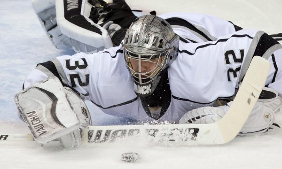 Kings goalie Jonathan Quick makes a save during a 2-1 loss to the Vancouver Canucks on Saturday. Quick and the Kings will enjoy a three-day break before embarking on the final three games of the regular season.