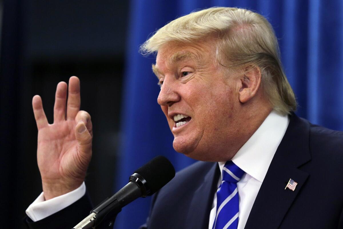 Republican presidential candidate Donald Trump gestures during an event in Hampton, N.H. in August of 2015.