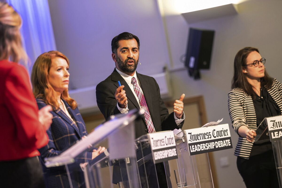 From left, SNP leadership candidates Ash Regan, Humza Yousaf and Kate Forbes taking part in the SNP leadership debate in Inverness, Scotland, Friday, March 17, 2023. The Scottish National Party is finding out that Nicola Sturgeon is a hard act to follow. Scotland’s governing party is choosing a replacement for a leader who came to dominate Scottish politics but hit an impasse in the campaign for independence from the United Kingdom, and split the party with a transgender rights law. (Paul Campbell/PA via AP)