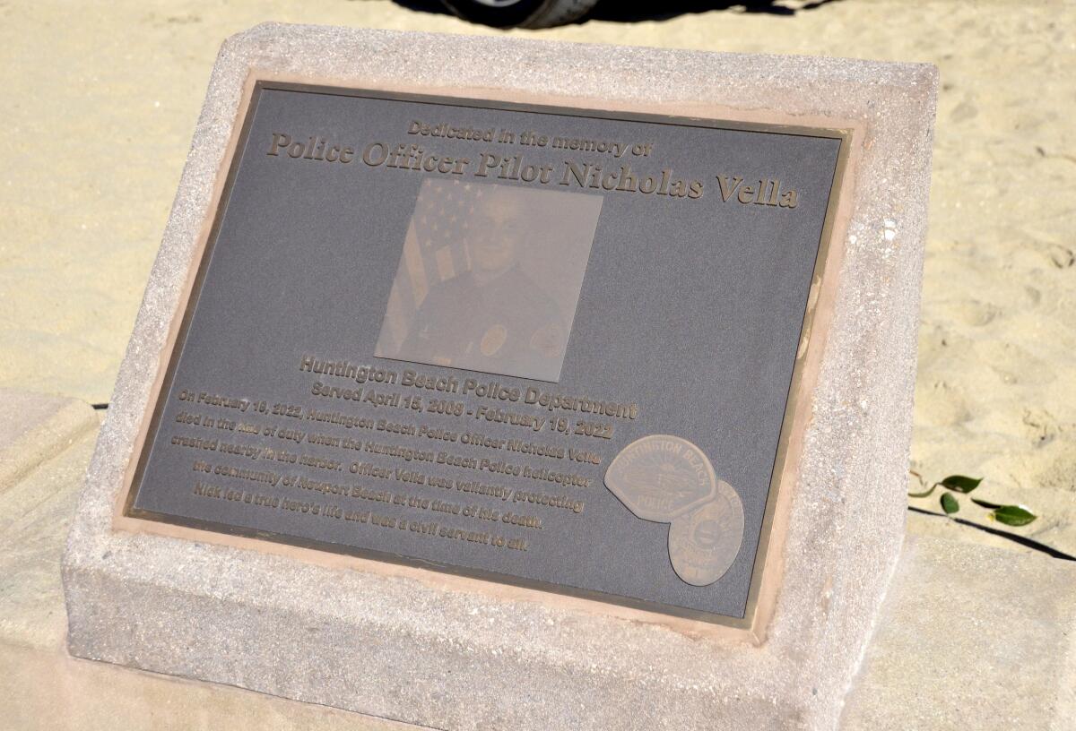 The newly installed plaque on the seawall at Marina Park was dedicated Sunday in honor of late HBPD Officer Nicholas Vella.