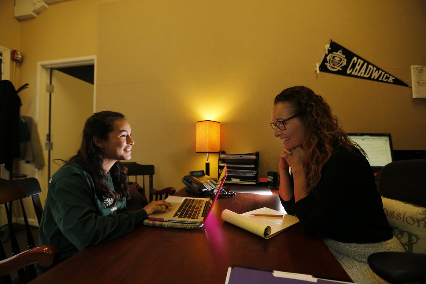 Lizbeth Ledesma talks college plans with counselor Alicia Valencia Akers at Chadwick School on the Palos Verdes Peninsula.