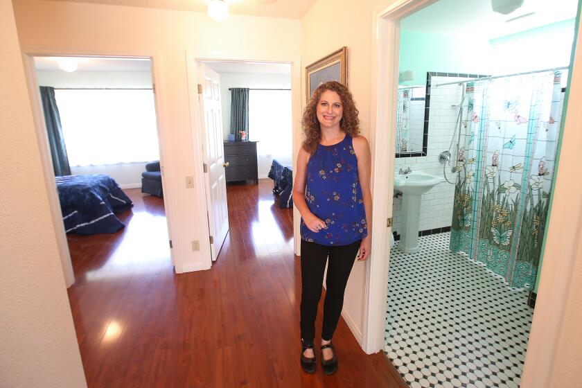 Executive Director Michelle Wulfstieg stands in the Heavenly Home, an end-of-life care home for terminal patients in Mission Viejo. The home is one of only three homes in California, and the first in Orange County.