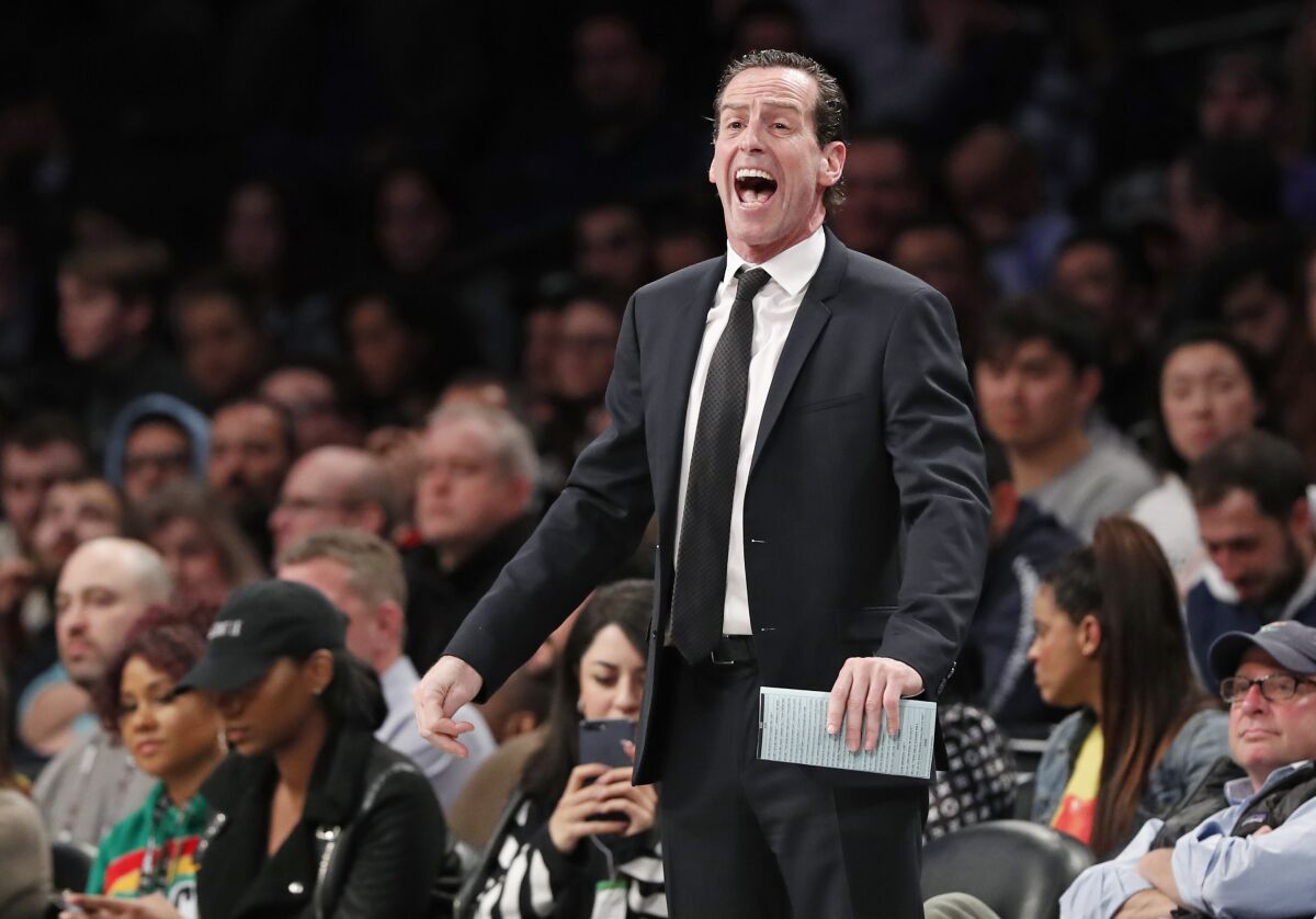 Kenny Atkinson yells from the sideline in 2020 while he was head coach in Brooklyn.