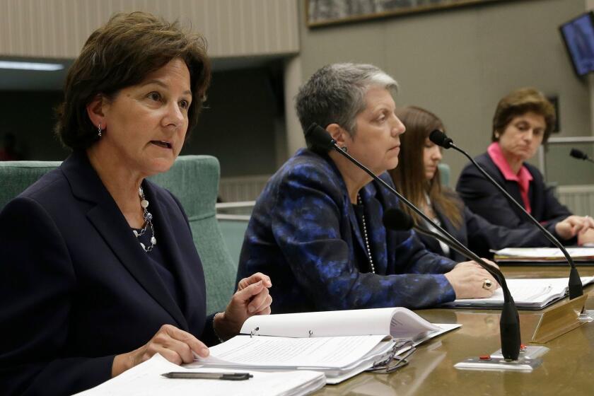 Monica Lozano, left, chair o fthe University of California Board of Regents, discusses the findings of a state audit concerning the office of UC President Janet Napolitano, second from left, during a hearing of the Joint Legislative Audit Committee Tuesday, May 2, 2017,in Sacramento, Calif. Lawmakers where looking into the audit, conducted by the office of State Auditor Elaine Howle, right, that found that UC administrators hid $175 million from the public while the university system raised tuition and asked lawmakers for more money. Napolitano has disputed the audit's findings. (AP Photo/Rich Pedroncelli)