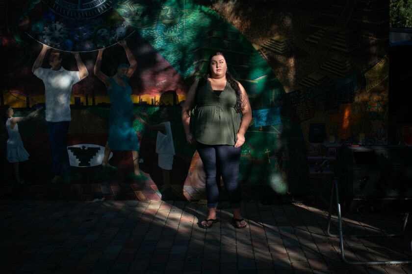 NORTHRIDGE, CA - OCTOBER 28: Sara Rodriguez poses for a portrait at a Project Rebound mixer that supports formerly incarcerated students on Cal State campuses on Thursday, Oct. 28, 2021 in Northridge, CA. Rodriguez is a graduate of Cal Poly Pomona and just got her MSW from UCLA in June. Before that, she was incarcerated on charges stemming from her weed felony. (Jason Armond / Los Angeles Times)