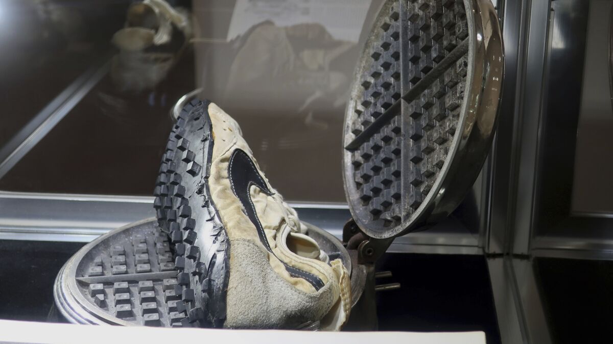Lo anterior arma cómo Nike track shoes used in 1972 Olympic trials sell for $50K - The San Diego  Union-Tribune