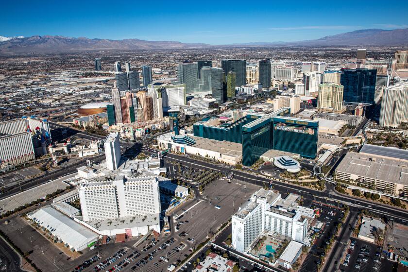 LAS VEGAS, NV - JANUARY 11: Hotels and attractions, including The Tropicana, The MGM Grand, New York New York and Aria Hotels & Casinos, along the Las Vegas Strip are viewed from the air on January 11, 2022 over Las Vegas, Nevada. Conventions and gamblers have once again returned in large numbers to Sin City despite a surge of infections and hospitalizations due to the Omicron Covid virus. (Photo by George Rose/Getty Images)