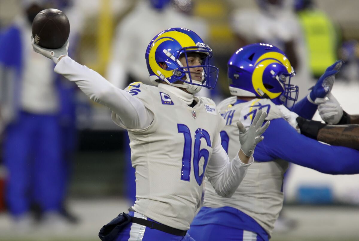 Los Angeles Rams quarterback Jared Goff (16) passes during the first half of an NFL divisional playoff.