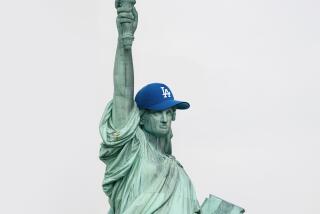 photo illustration of the Statue of Liberty wearing a blue L.A. Dodgers baseball cap