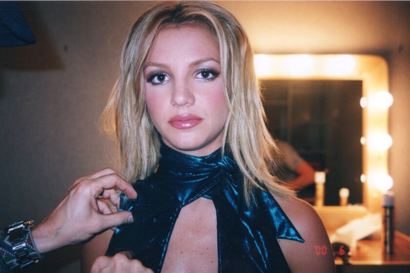 Behind the scenes during the shoot for the "Lucky" music video in 2000. A moment captured by Britney Spears' assistant and friend Felicia Culotta.