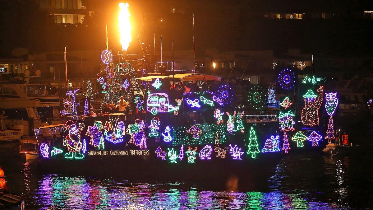 El Navegante, which honored California firefighters, split the Sweepstakes award in the 2018 Newport Beach Christmas Boat Parade.