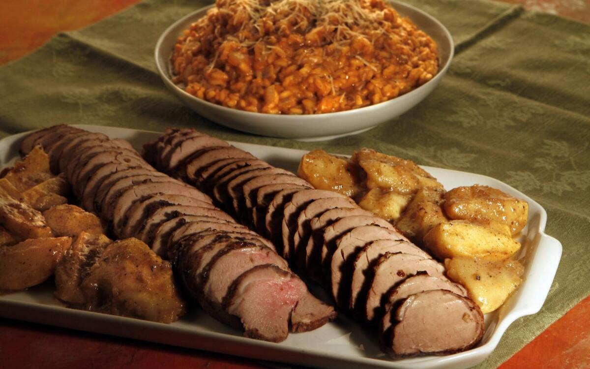 Spiced pork tenderloin with roasted apples and pumpkin risotto