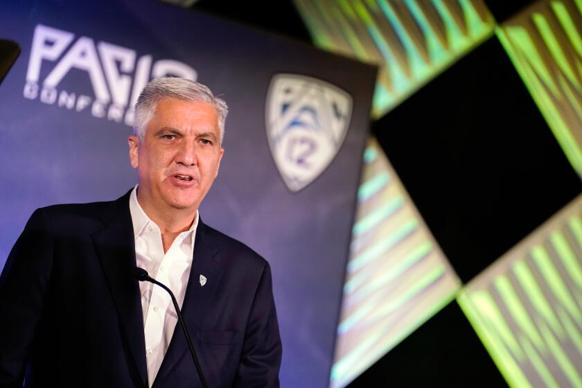 Pac-12 Commissioner George Kliavkoff speaks during the Pac-12 Conference NCAA college football Media Day in 2021