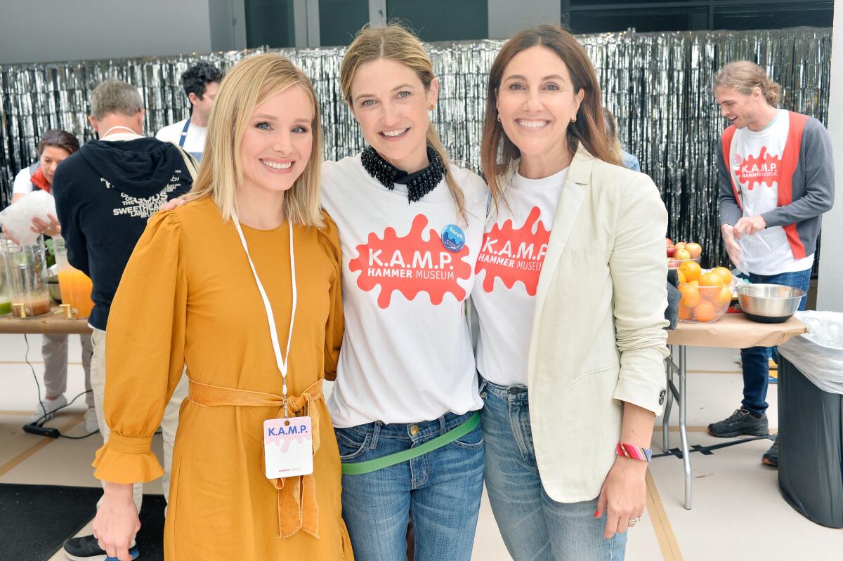 Kristen Bell, left, Sarah McHale and Brooke Kanter attend the Hammer Museum K.A.M.P. at the Hammer Museum in Los Angeles on Sunday.