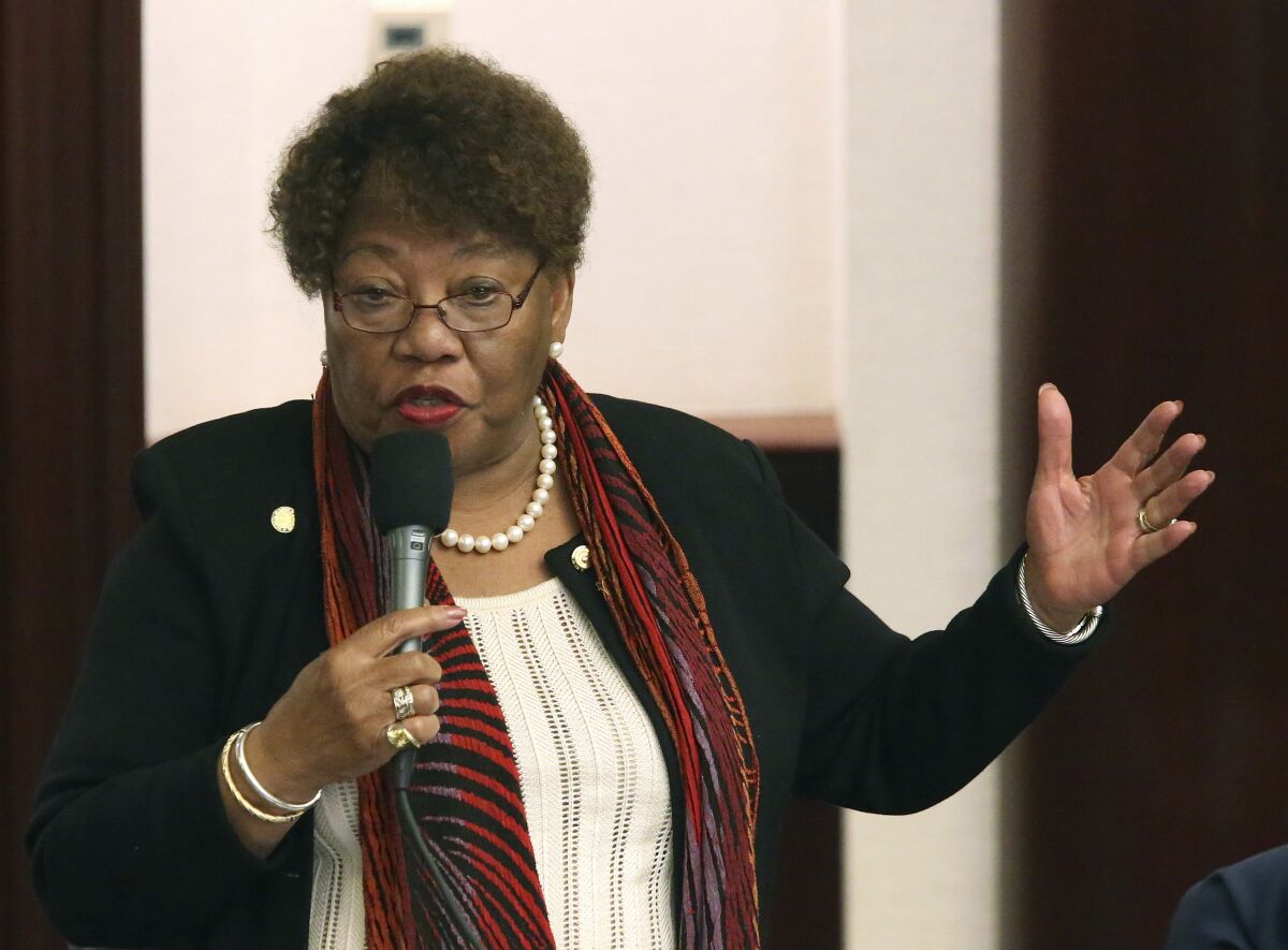FILE- In this April 17, 2019, file photo, Rep. Geraldine Thompson, D-Windermere, debates a bill during session in Tallahassee, Fla. Thompson is challenging the appointment of a Black woman to the Florida Supreme Court contending on Thursday, Sept. 10, 2020, that Republican Gov. Ron DeSantis is engaging in “racial tokenism” by choosing someone the court itself has already ruled is not eligible for the position. (AP Photo/Steve Cannon, File)