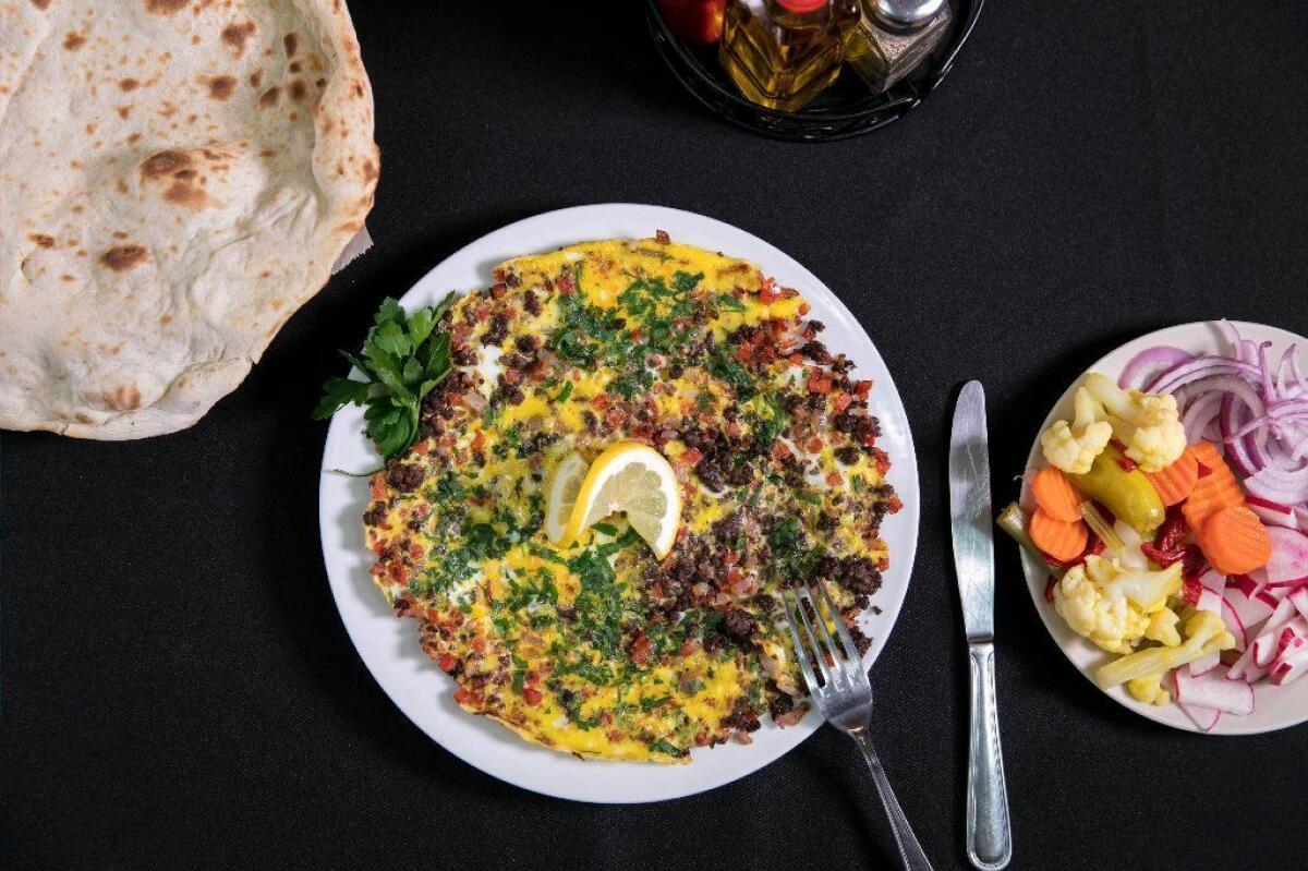Makhlama, a vegetable and ground beef scrambled egg-omelette, is a staple on Akkad's breakfast menu.