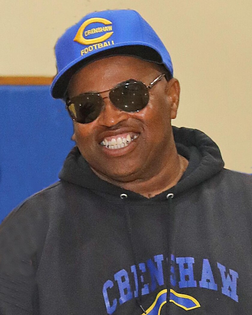 Crenshaw football coach Robert Garrett has provided stability to a program while teaching discipline and life lessons.