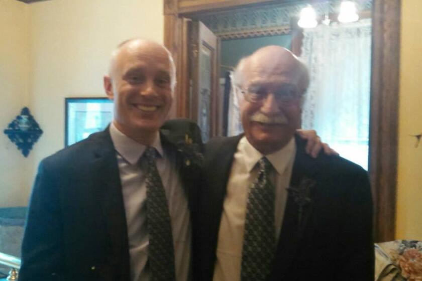 Matthew T. Hall (left) and his father, Douglas D. Hall, in 2014