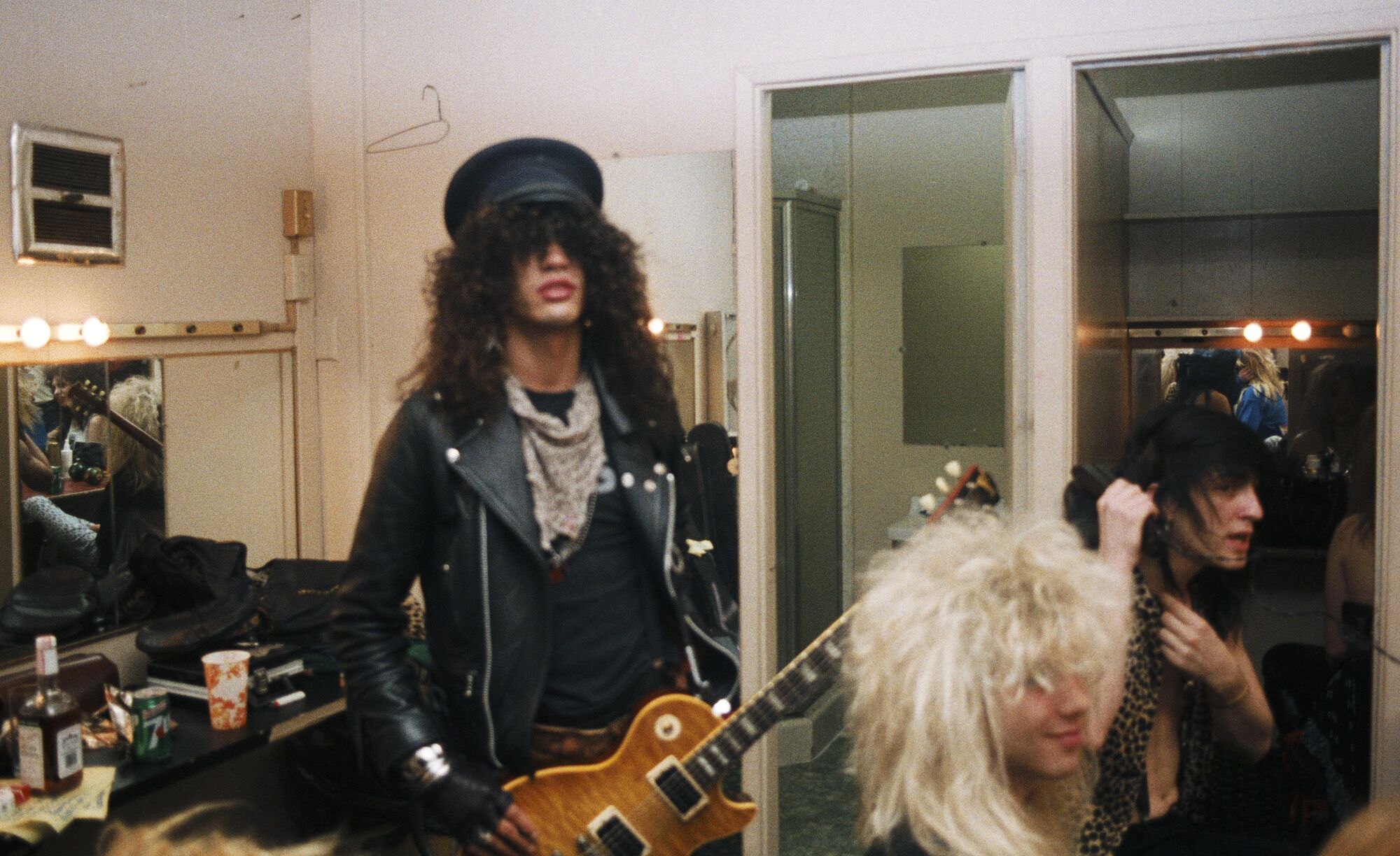 A hair-metal band backstage in the '80s.