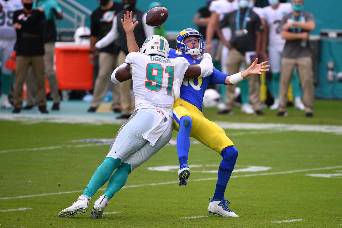 Rams quarterback Jared Goff fumbles the ball as he is hit by Miami's Emmanuel Ogbah.
