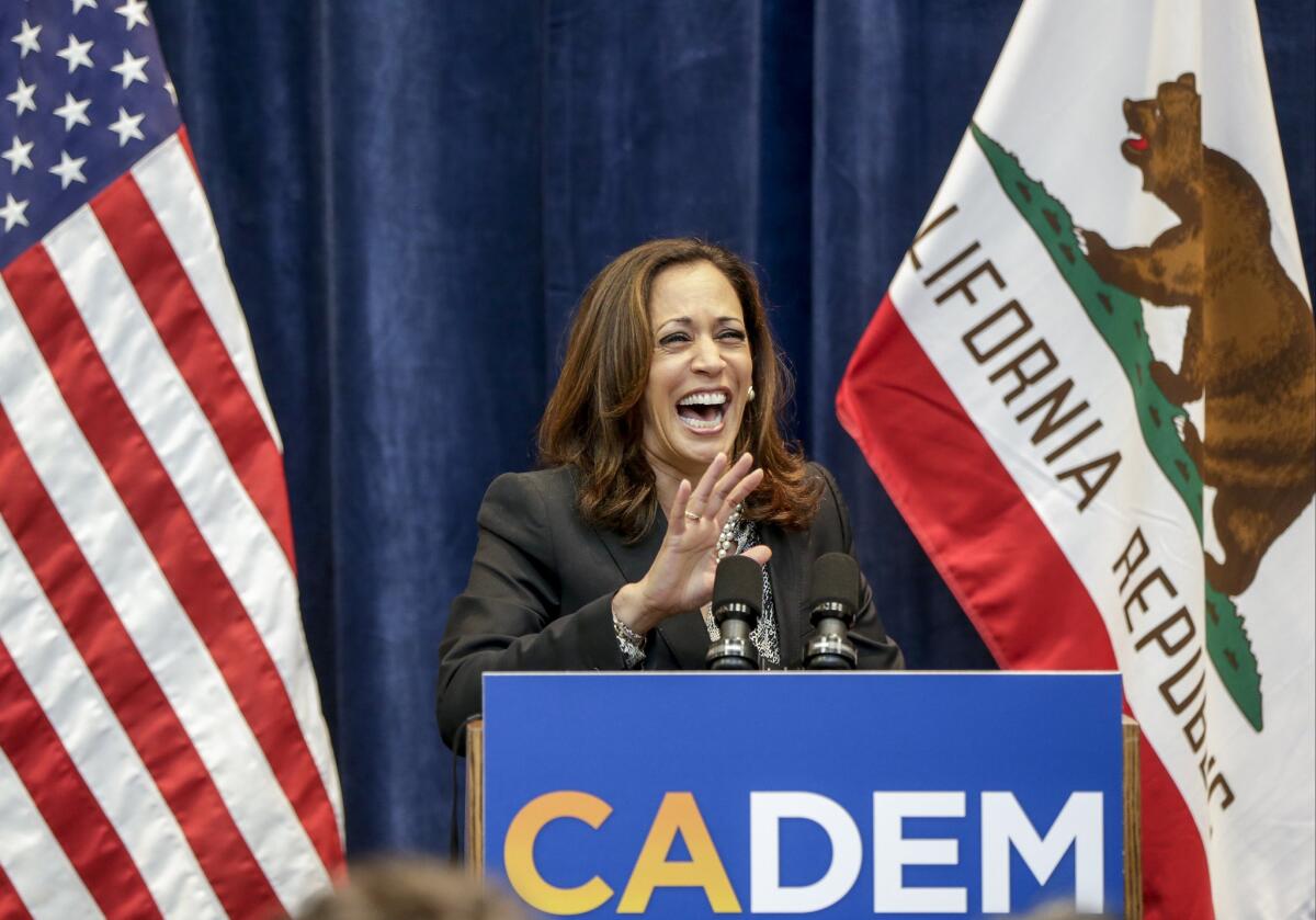 California Atty. Gen. Kamala Harris takes questions from the media after speaking at the state Democratic convention in Anaheim on Saturday.