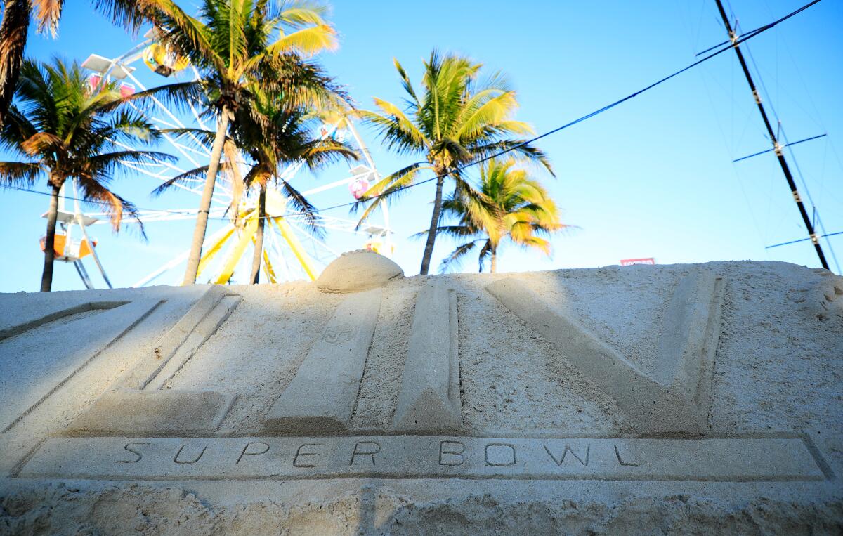 Super Bowl LIV logo in sand
