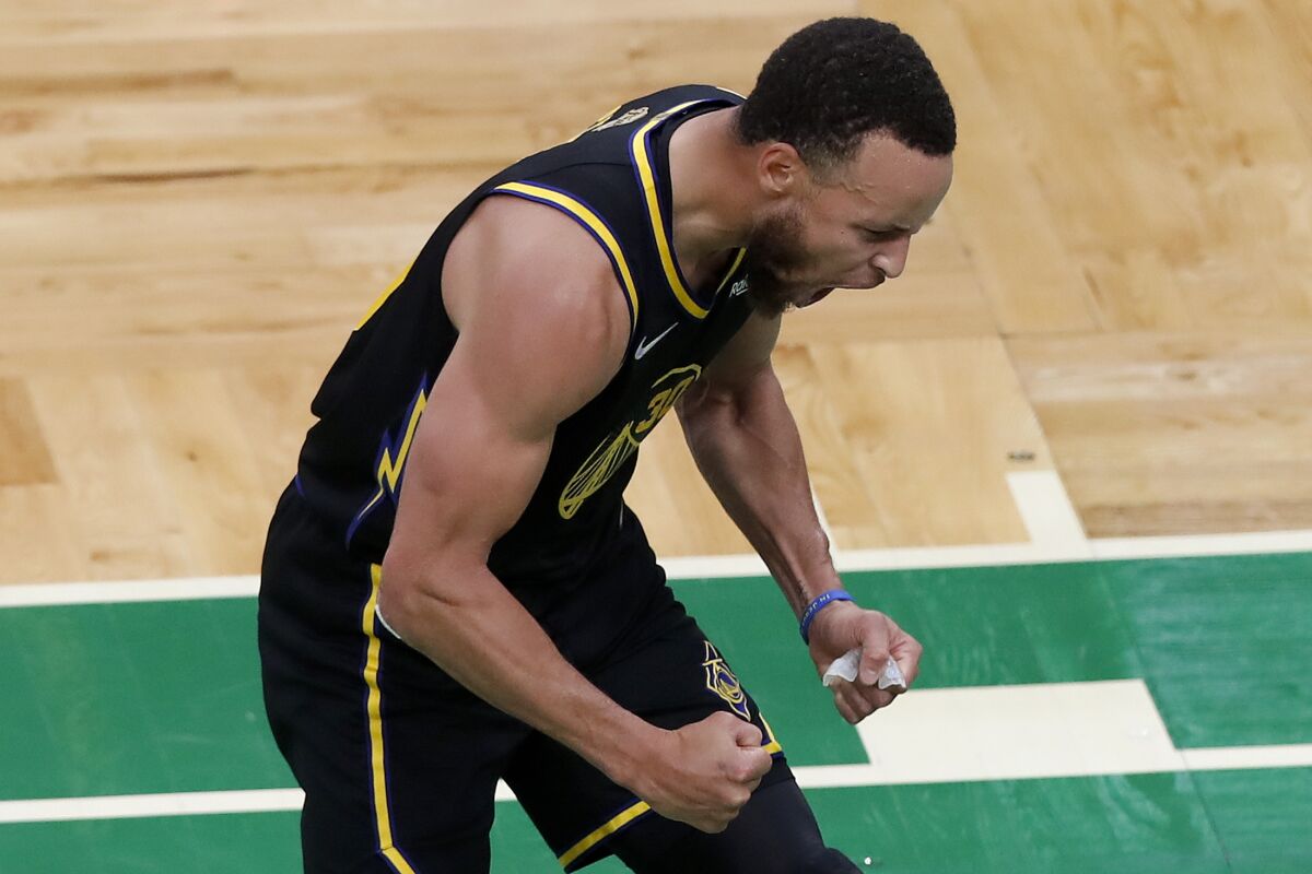 Golden State's Stephen Curry is fired up in a win over the Boston Celtics in Game 4 of the NBA Finals on June 10, 2022.