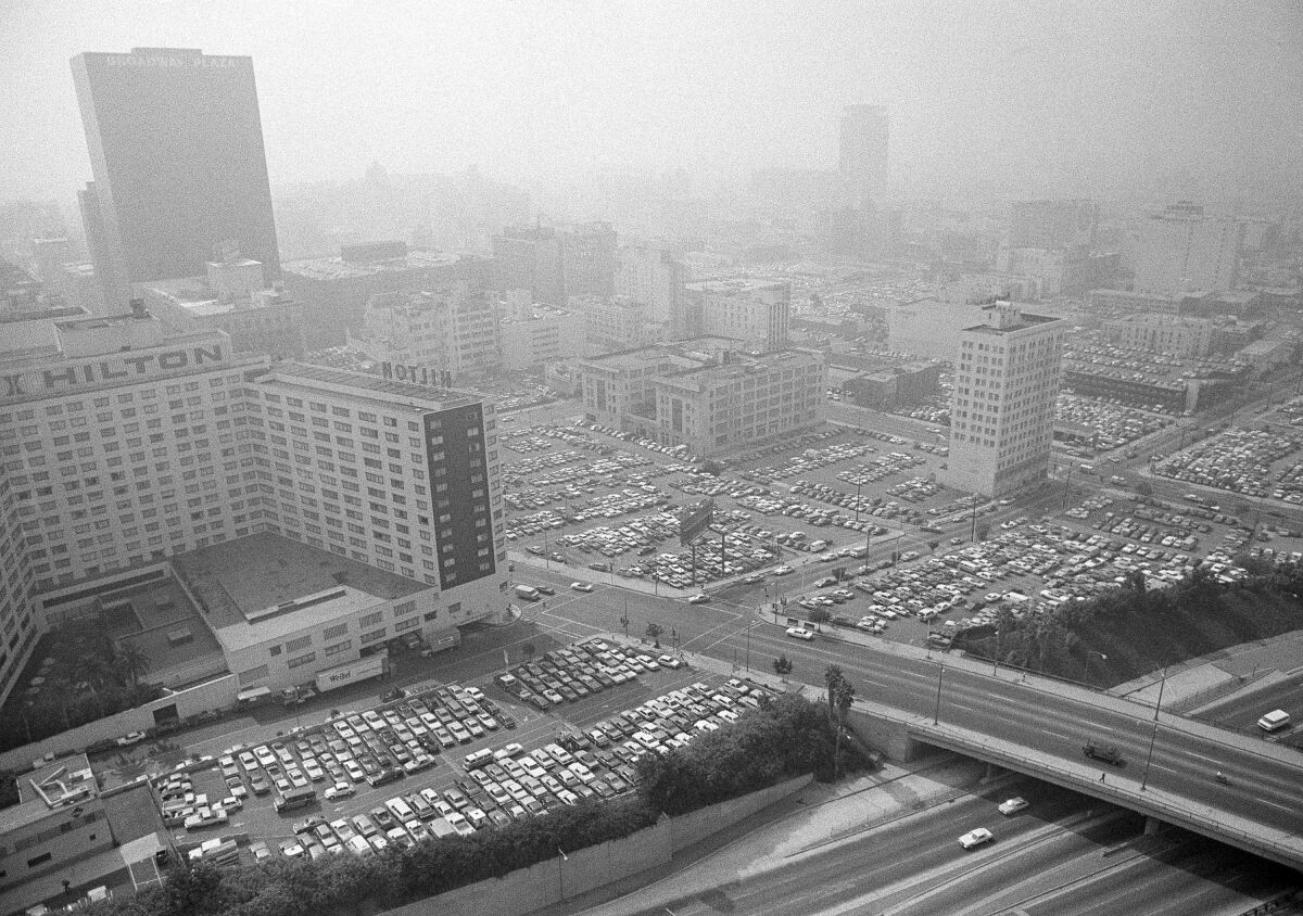 A black-and-white photo of packed parking lots in downtown L.A.