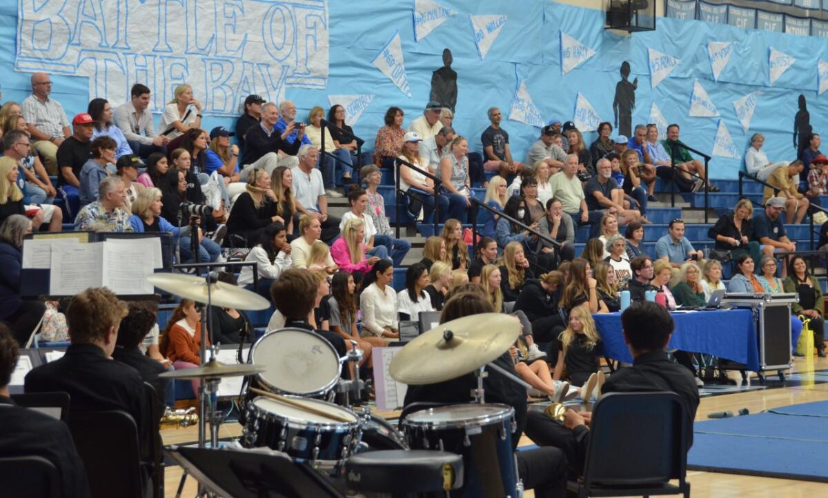 Alumni, parents, students and community members enjoy the pep rally performance.
