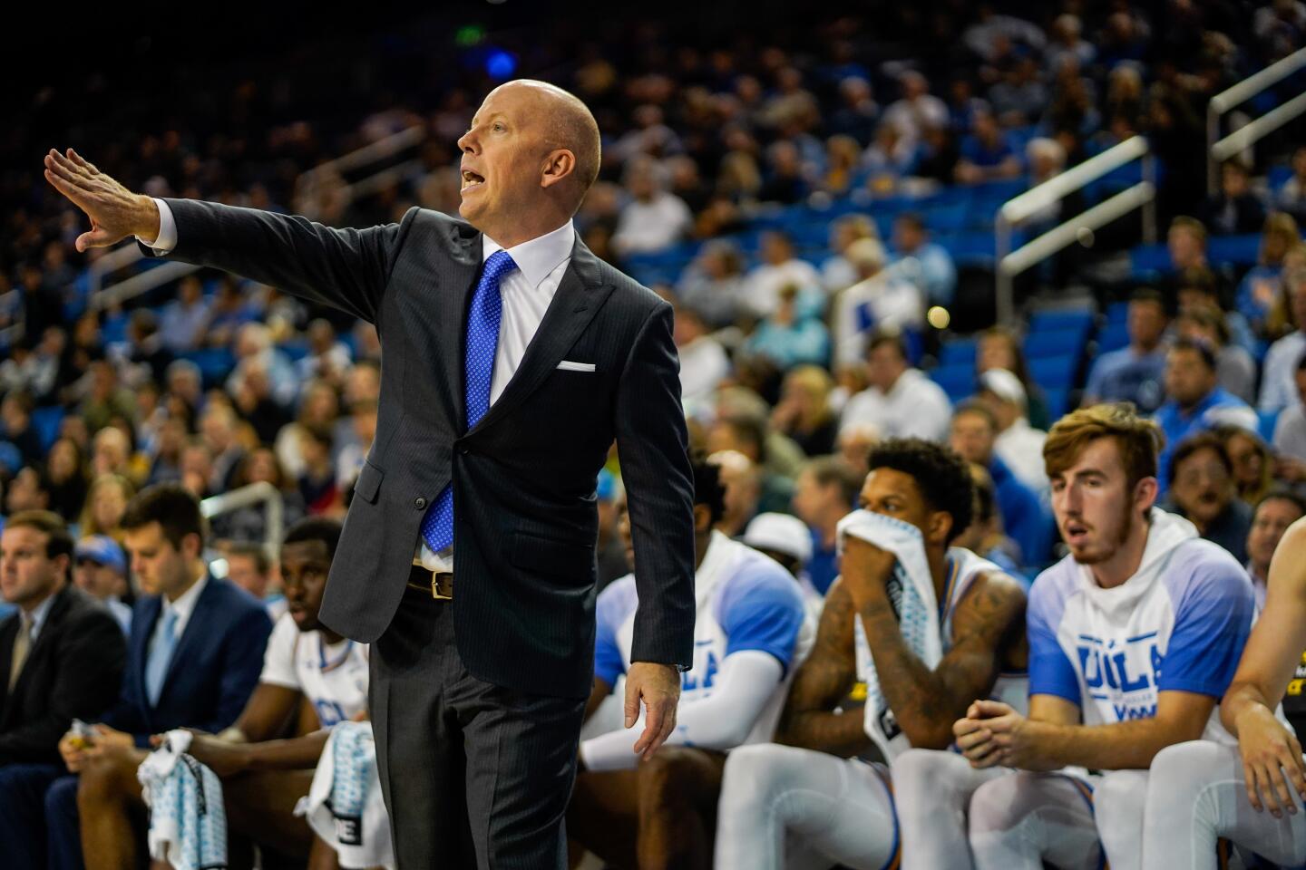 UCLA coach Mick Cronin gestures to his players during the first half of a game against Long Beach State on Nov. 6 at Pauley Pavilion.