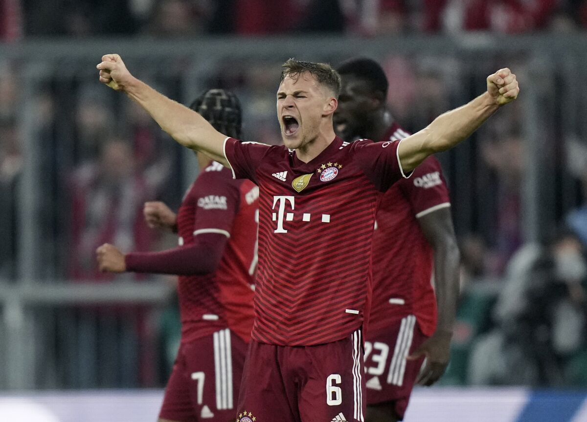Bayern's Joshua Kimmich celebrates after the German Bundesliga soccer match between FC Bayern Munich and SC Freiburg in Munich, Germany, Saturday, Nov. 6, 2021. (AP Photo/Matthias Schrader)