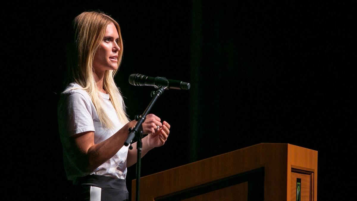 Lauren Scruggs Kennedy, a former model and current fashion blogger who lost her left hand and left eye in 2011, speaks to students involved in Sage Prosthetics, a group that helps create 3-D prosthetics for people in need, at Sage Hill School on Wednesday.