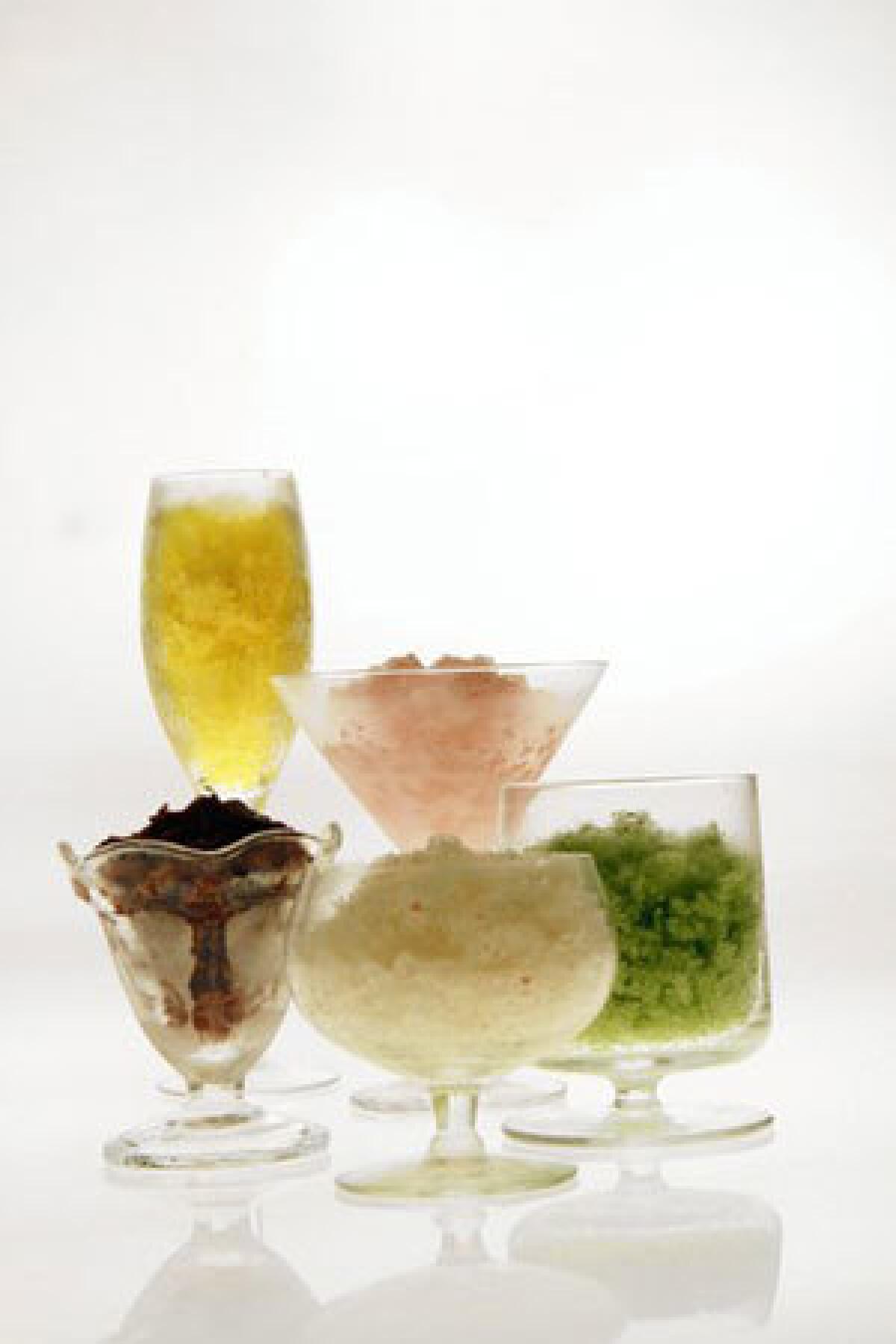 Granita can be made in any flavor you like. Clockwise from left, cherry, mango, rose water, cucumber chile and green tea granitas.