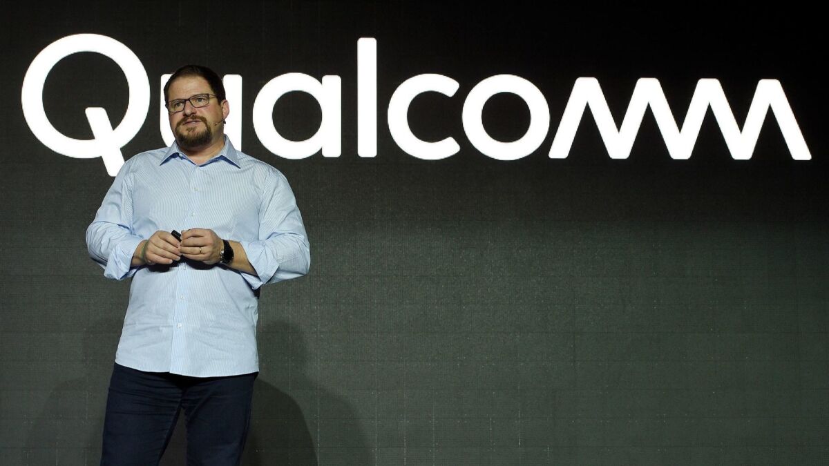 Qualcomm, led by Cristiano Amon, will supply chips and license its technology to Apple and will receive royalty payments, the companies said.