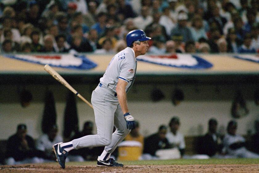 Los Angeles Dodgers Mickey Hatcher hits a fourth inning single against the Oakland A's in Game 5 of the World Series at Oakland Coliseum, Oct. 20, 1988. Hatcher hit a two-run home run in the game, scored two runs and leads all hitters in the series with seven. (AP Photo/Eric Risberg)