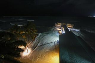 Hurricane Beryl's winds batter Carlisle Bay in Bridgetown, Barbados, Monday, July 1, 2024. (AP Photo/Ricardo Mazalan)